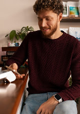 The man pays with a card through the terminal