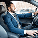 man in car