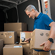 Courier scanning a package next to a delivery van